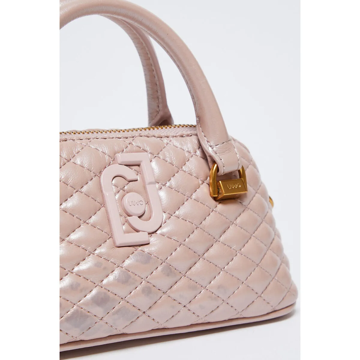Bolso de mano brillante guateado