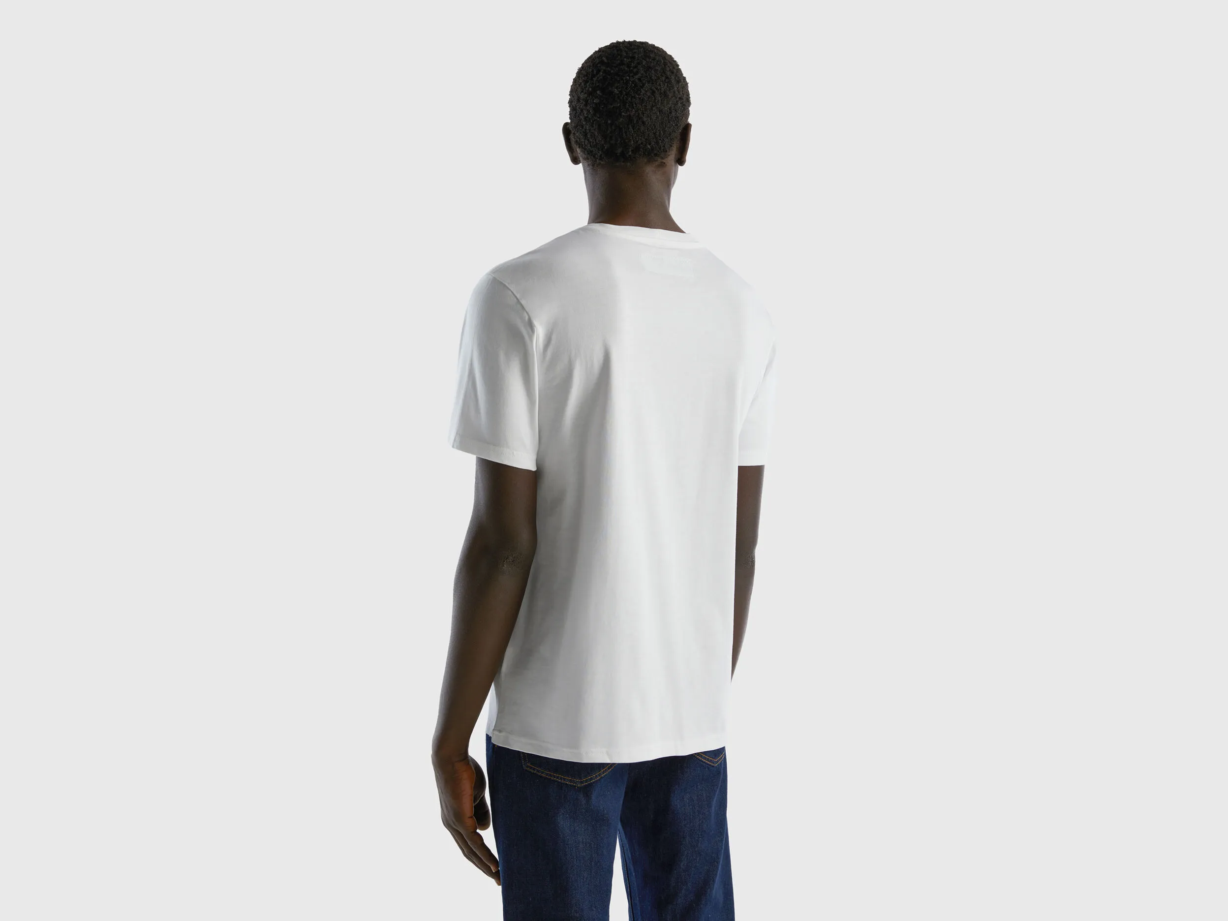 Camiseta de 100 % algodón con bolsillo