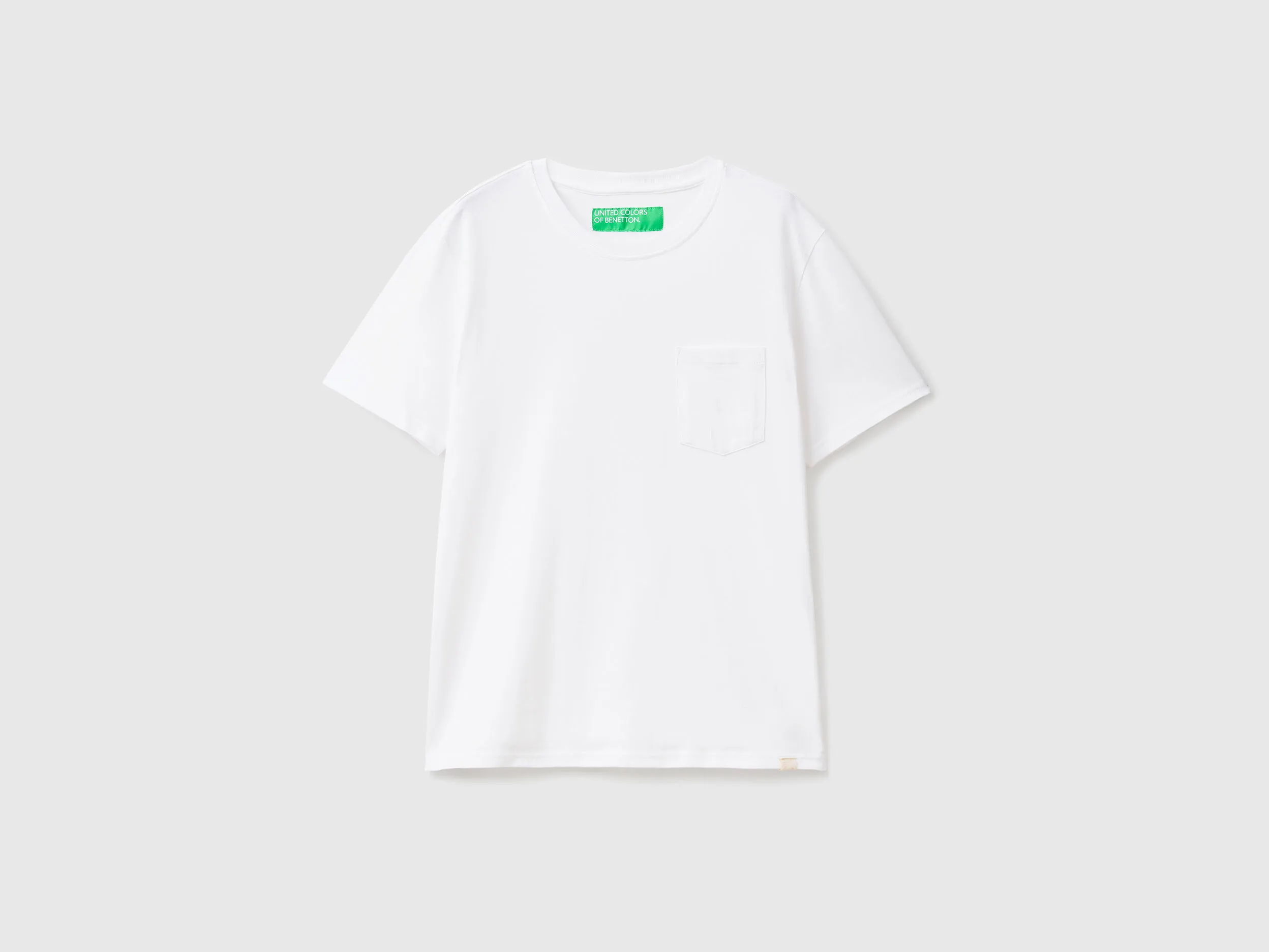 Camiseta de 100 % algodón con bolsillo