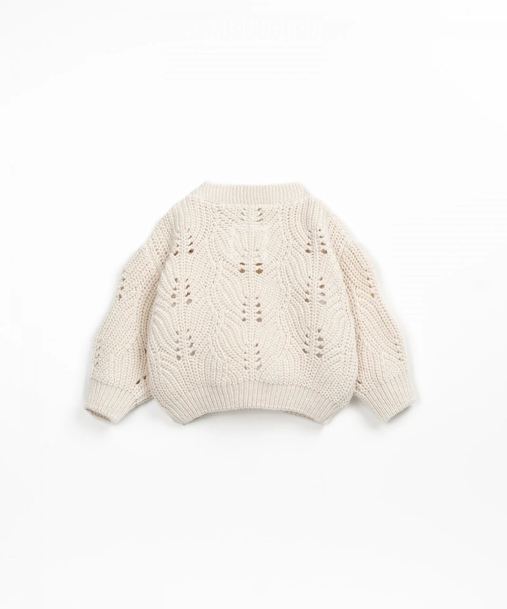 Chaqueta tejida con botones de coco | Textile Art