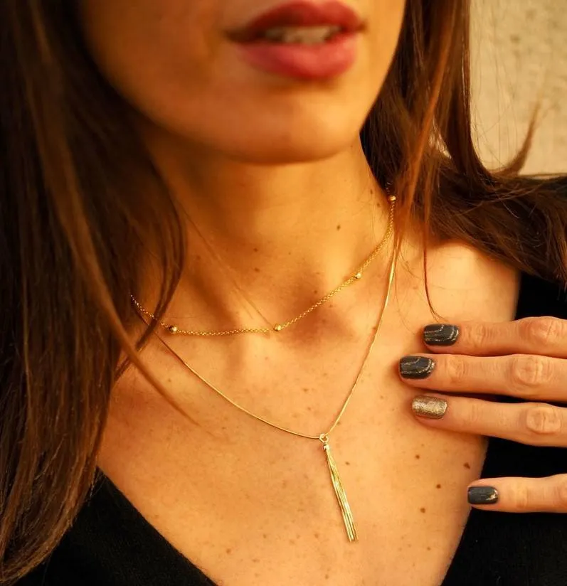 Collar de cadena con bolitas oro