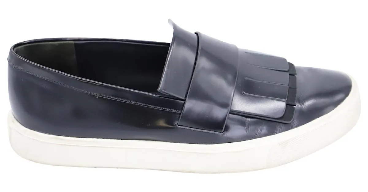 VINCE CONVENTRY ZAPATILLAS SLIPON KILTIE CON FLECOS EN CUERO NEGRO 